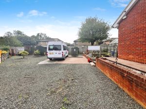 Land to the side of property- click for photo gallery